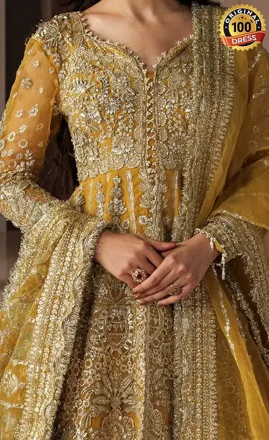 Yellow lehenga choli for wedding guests with elegant hand embroidery and traditional detailing