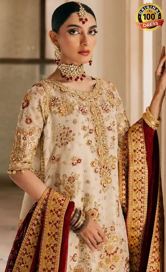 White embroidered gharara suit with jamawar detailing and elegant wedding wear design
