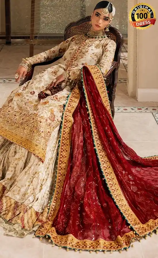 Pakistani white gharara suit for wedding guests with intricate embroidery and formal detailing