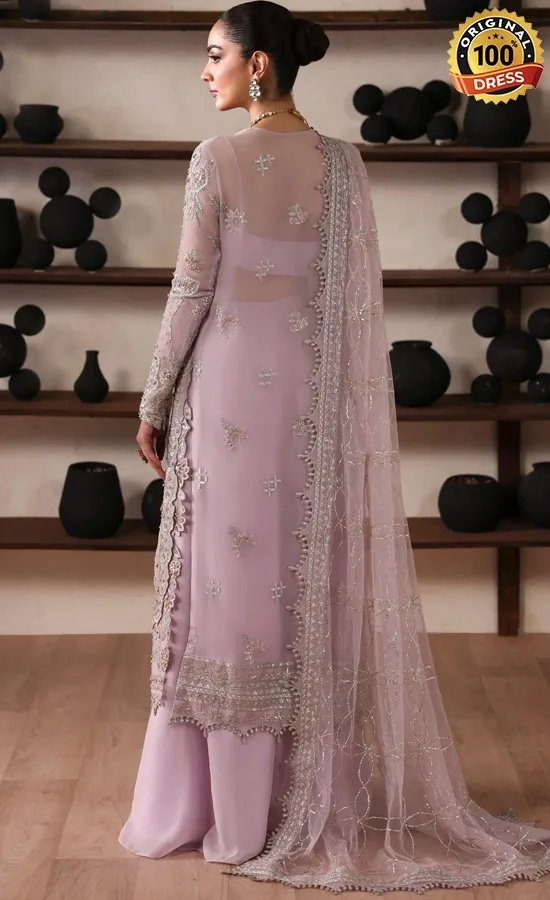 Baby pink salwar kameez for wedding guests with elegant chiffon embroidery and traditional detailing
