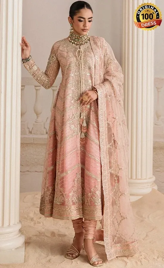 Peach colour shalwar kameez for wedding guests with elegant embroidery and floral