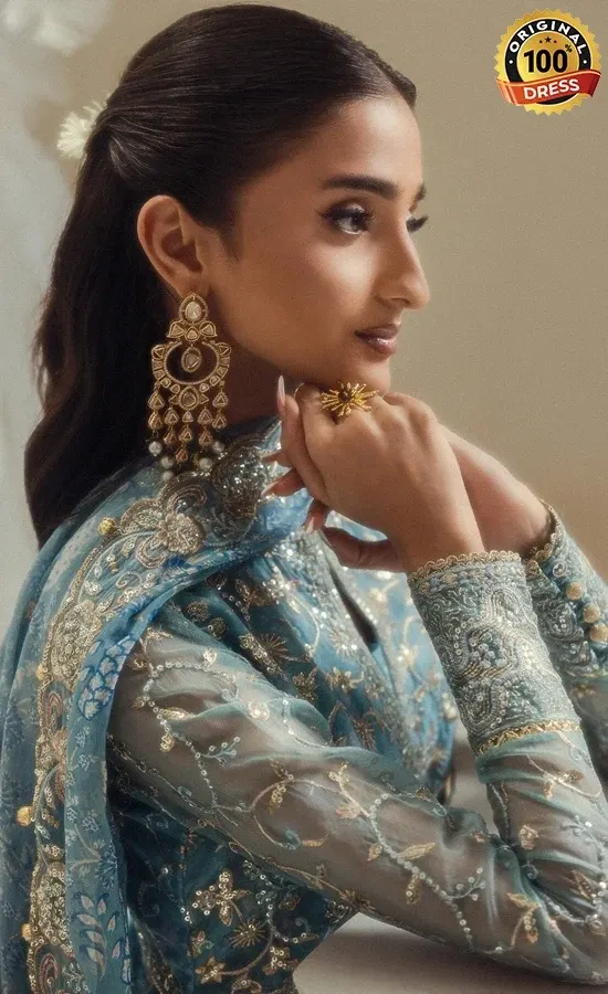Blue colour Anarkali dress for wedding guests with elegant organza embroidery and traditional detailing