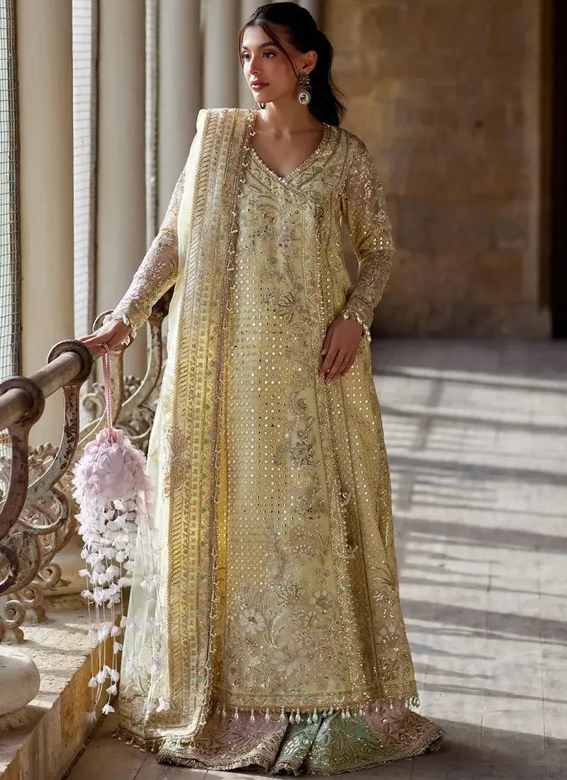 Embroidered Yellow Wedding Guest Suit Yellow shalwar kameez with embroidered front panels and patchwork detailing