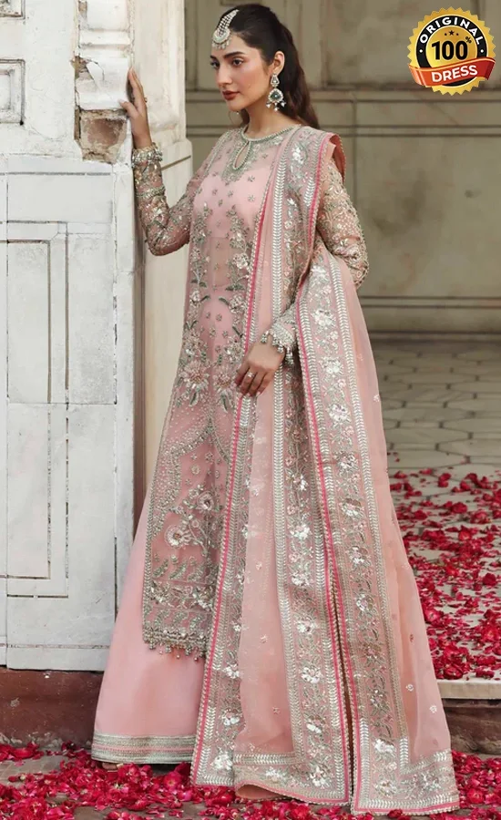 Embroidered pink sharara suit with tassels, patchwork and detailed hand finishing