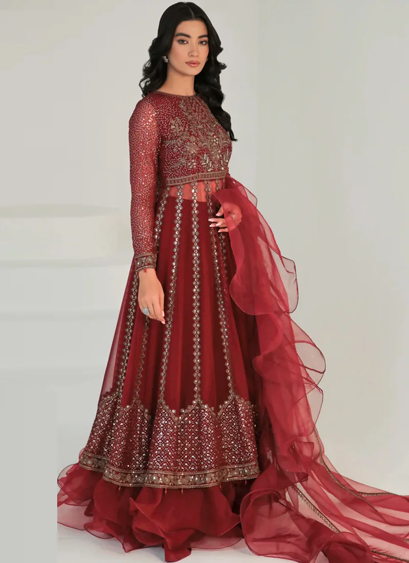 Pakistani maroon lehenga with hand embroidery, 3D floral embellishments and decorative tassels