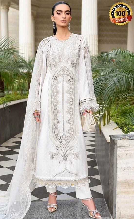 White Indian Suit For Wedding Guests White Indian suit for wedding guests with elegant hand embroidery and lawn fabric