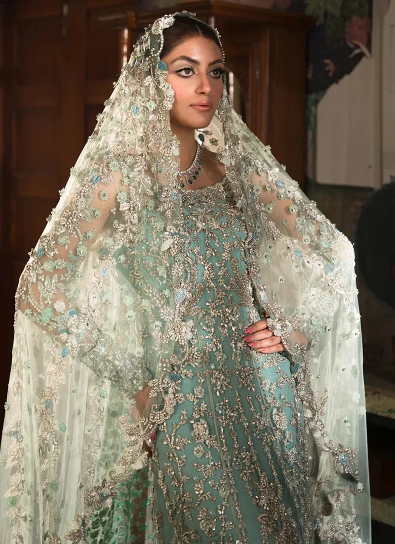 Ice blue Ammara Khan-inspired Nikkah maxi with boat neckline, silver vine embroidery, long trail and organza dupatta
