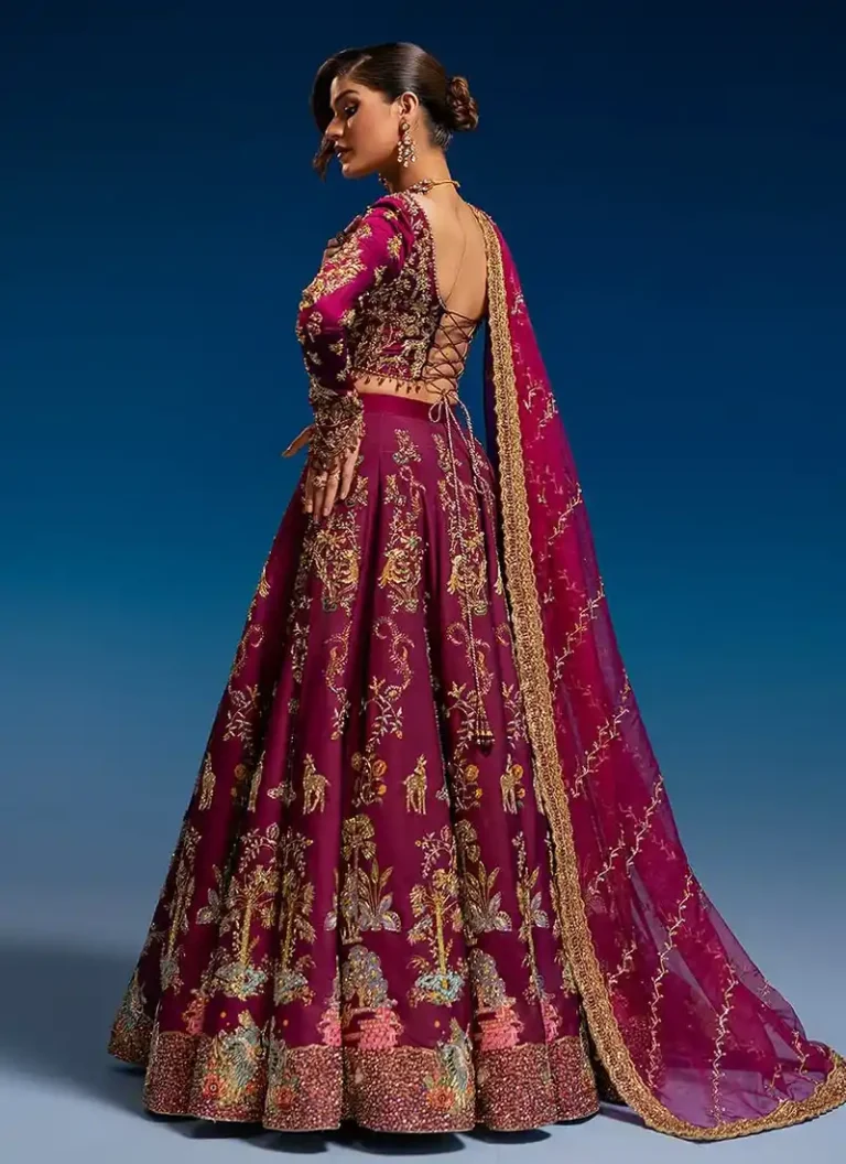 Ahmed Sultan-inspired burgundy bridal lehenga with gold tilla, zari, dabka and mirror work.
