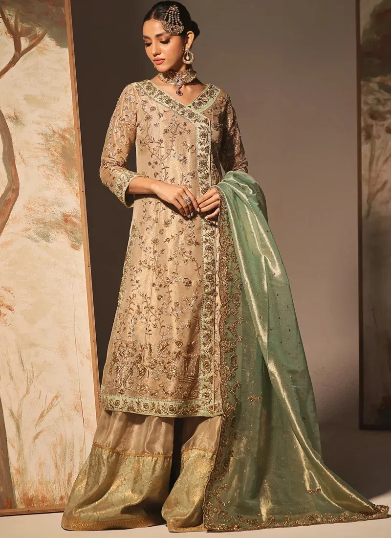 Champagne Gold Bridal Angrakha with Flapper Trousers Champagne gold wedding Angrakha dress with elegant bridal styling and mint green dupatta