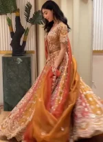 Sweetheart Neckline Lehenga Choli in Orange Video