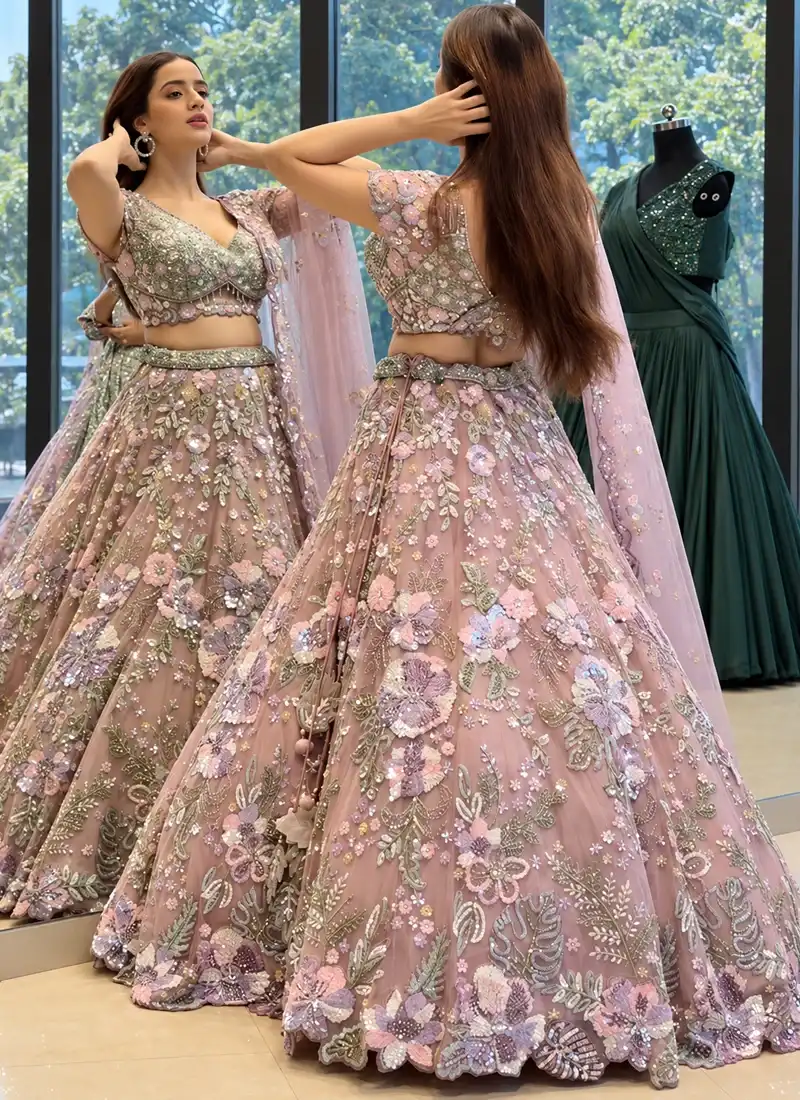 Dusty mauve 14-kali bridal lehenga with raised pastel flowers clustered toward the hem