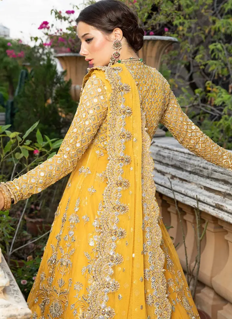 Embroidered mustard Angrakha for Mehndi bride with handcrafted festive detailing
