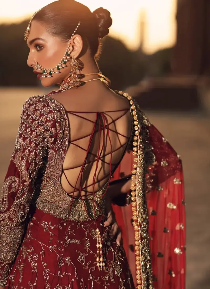 Deep red Erum Khan-inspired Nikkah maxi with sweetheart neckline, metallic embroidery, 14-kali skirt and organza dupatta