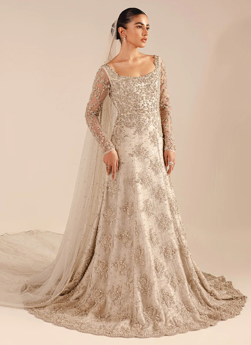 Ivory floor sweeping bridal gown with train featuring elegant silver and gold detailing
