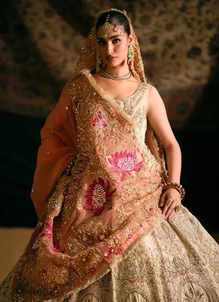 Ivory lehenga for Nikah ceremony with intricate hand embroidery and graceful bridal styling