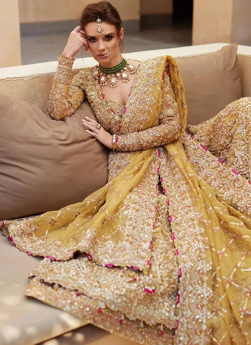 Mustard bridal Peshwas with antique silver, silver and rose-gold dabka, zari and salma sitara embroidery