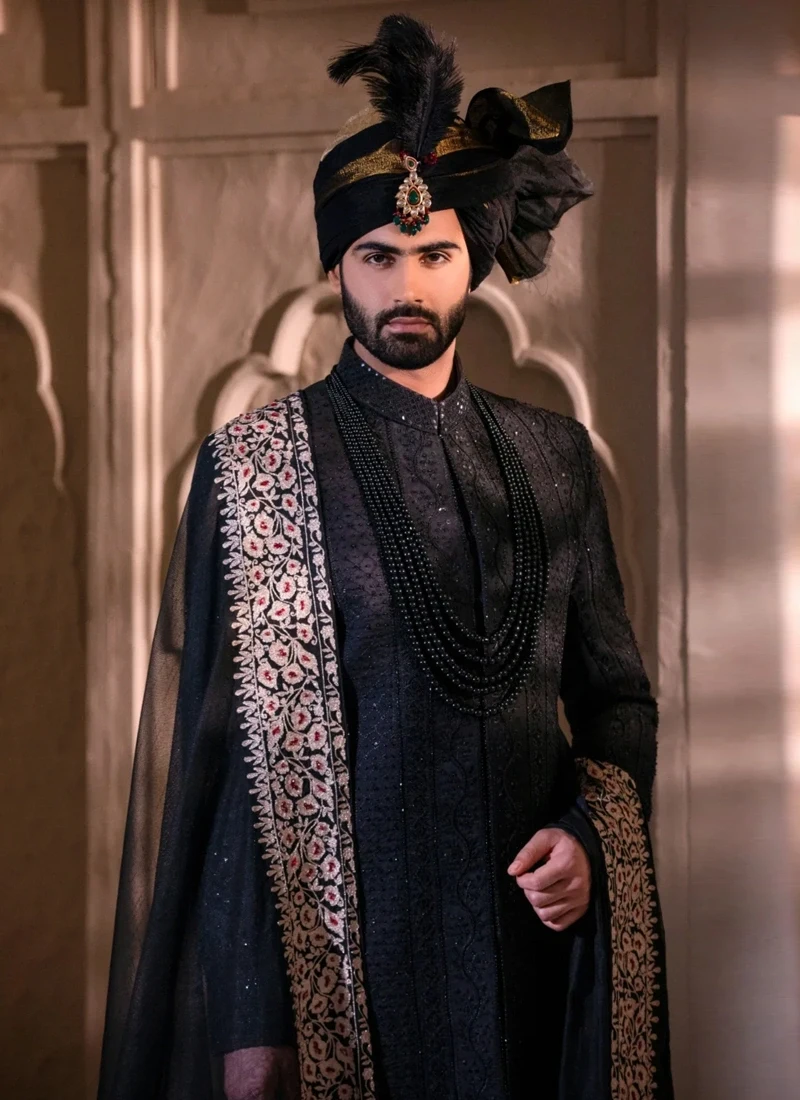 Pakistani black sherwani for groom with matching shawl and turban for wedding ceremonies