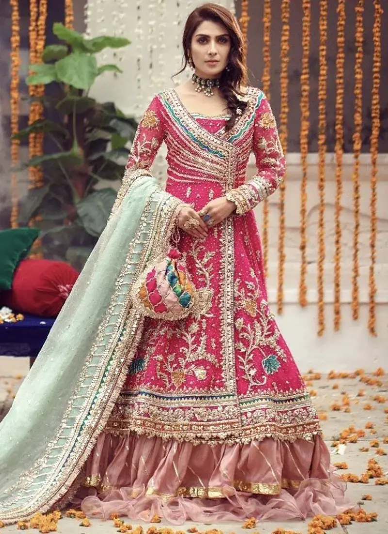 Pakistani Bridal Angrakha with Mint Dupatta Pakistani bridal Angrakha in shocking pink with mint dupatta and graceful ruffled lehenga