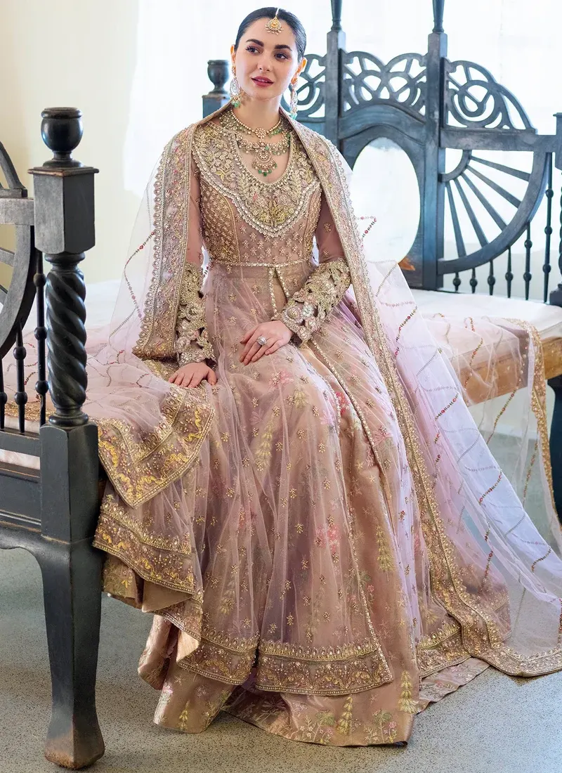 Baby pink open gown with lehenga, V neckline, full sleeves and pastel floral embroidery over a 12-kali panelled silhouette