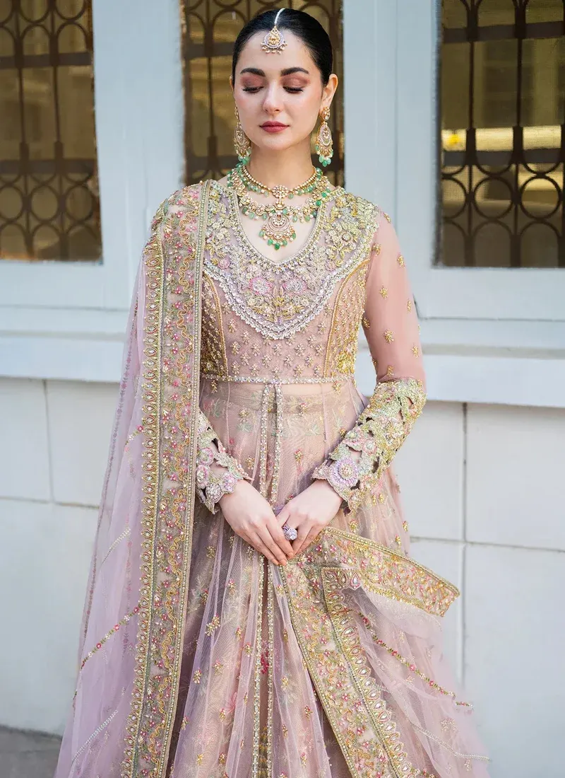 Sadaf Fawad Khan-inspired pale pink bridal set with cutwork cuffs, embroidered hem and organza dupatta edged in floral motifs