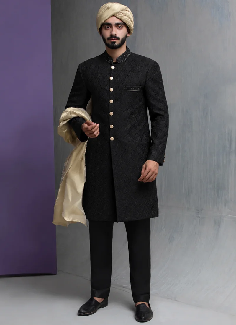 Traditional Black Wedding Sherwani with Gold Shawl Traditional black wedding sherwani with gold shawl and turban for elegant groom styling