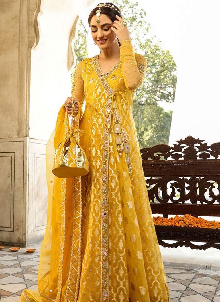 Yellow Angrakha Frock with Lehenga Yellow Angrakha frock with lehenga featuring elegant embroidery and traditional wedding styling