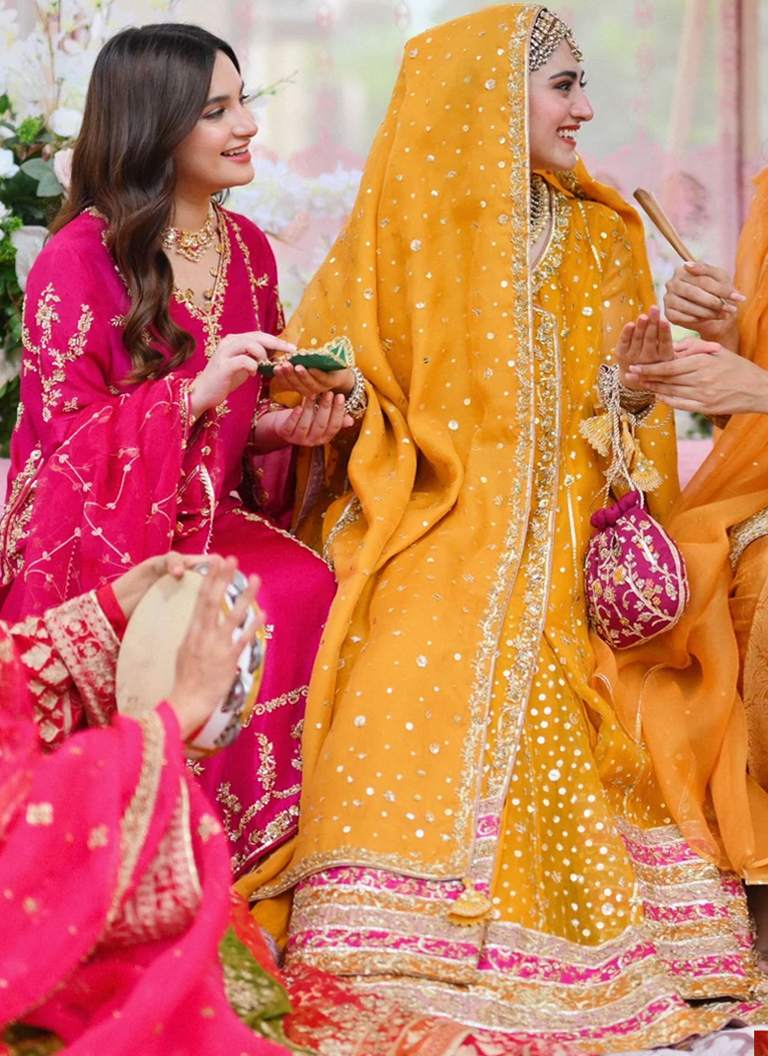 Yellow Mehndi Angrakha for bride with elegant embroidery and traditional bridal detailing