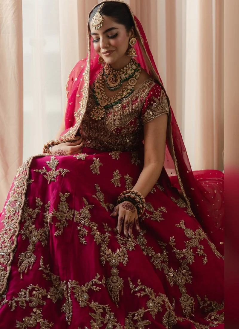 Fuchsia Pink Baraat Bridal Lehenga Choli with Gold Floral Embroidery – Front View Fuchsia Pink Baraat Bridal Lehenga Choli with Gold Floral Embroidery – Front View