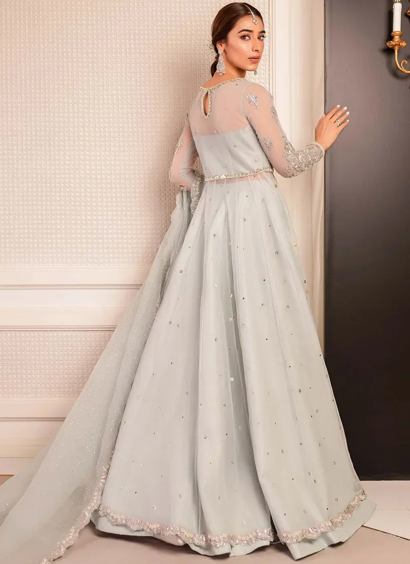 Ice blue open gown with lehenga, upper front view showing metallic floral embroidery and sheer sleeves