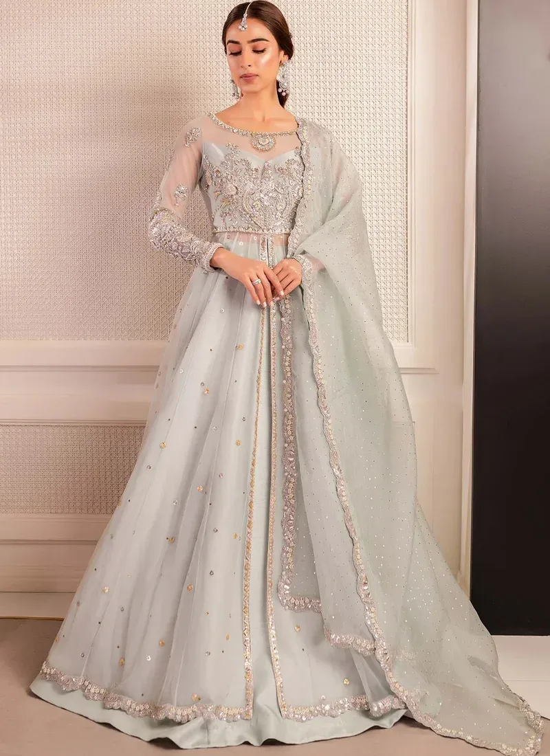 Ice Blue Reception Open Gown with Lehenga with Floral Medallion Yoke Ice blue gown and lehenga, back view showing keyhole neckline, wide flared skirt and sheer dupatta