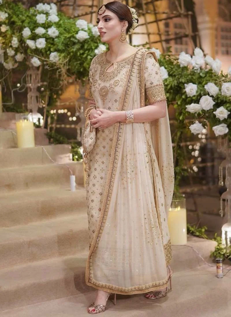 Ivory wedding guest long shirt suit, full front view with gold embroidered hem and matching sheer dupatta