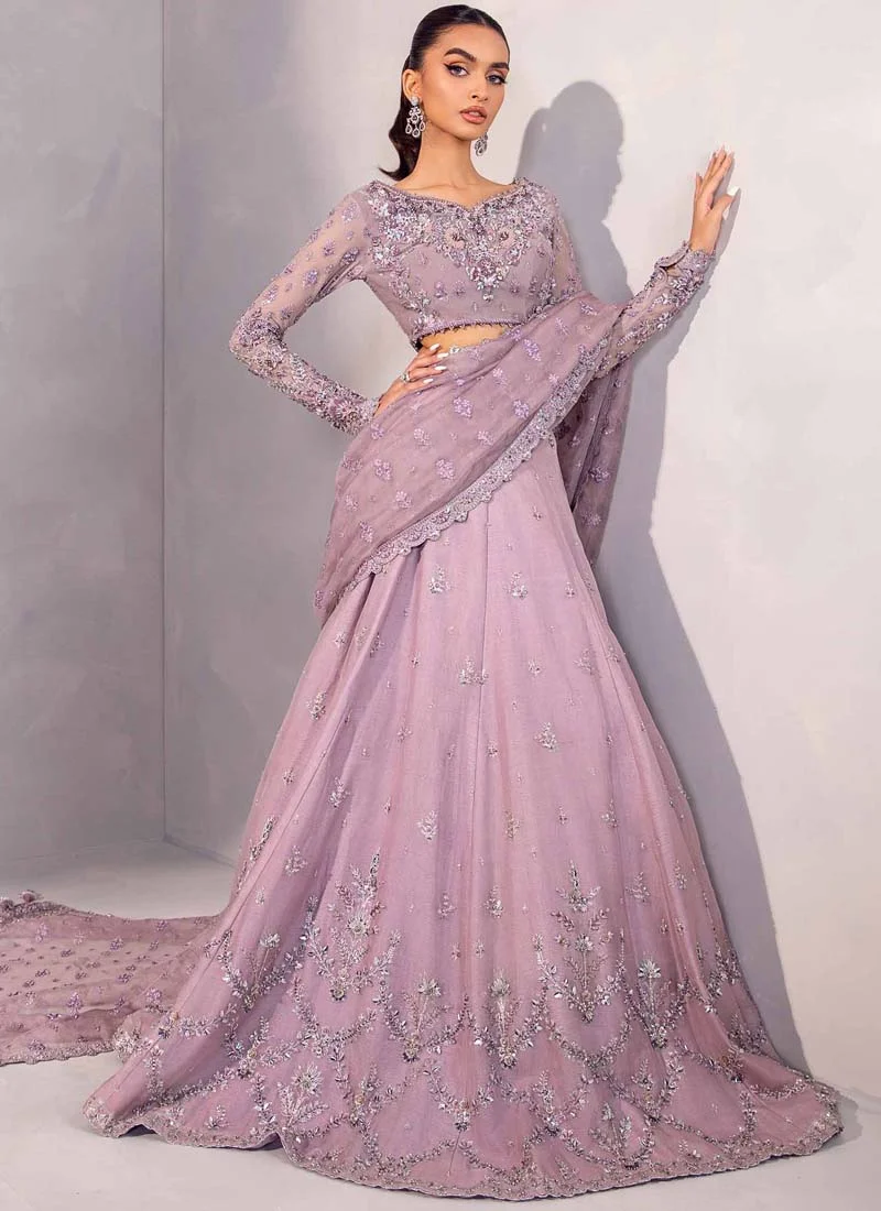 Lilac Engagement Saree with Floral Garland Arches Lilac lehenga saree front detail showing floral blouse embroidery and a scalloped saree drape border