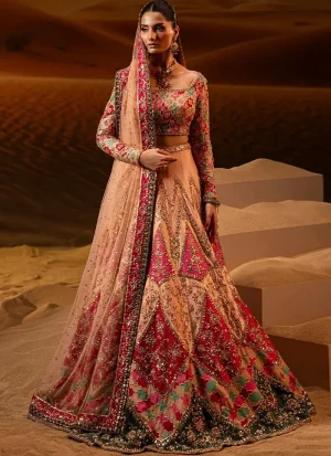 Peach and hot pink bridal lehenga choli front detail with gold floral embroidery and a wide scoop neckline