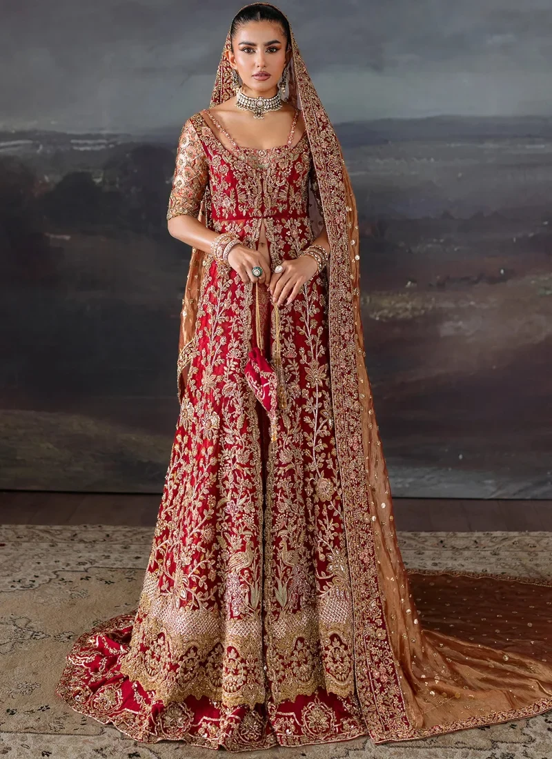 Red Baraat Gown with Scalloped Medallion Hem Red bridal gown three-quarter front view with gold floral zardozi and a richly embroidered dupatta border