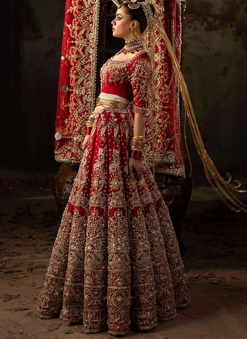 Red baraat lehenga choli full front view showing ornate scoop neckline and repeated floral skirt panels