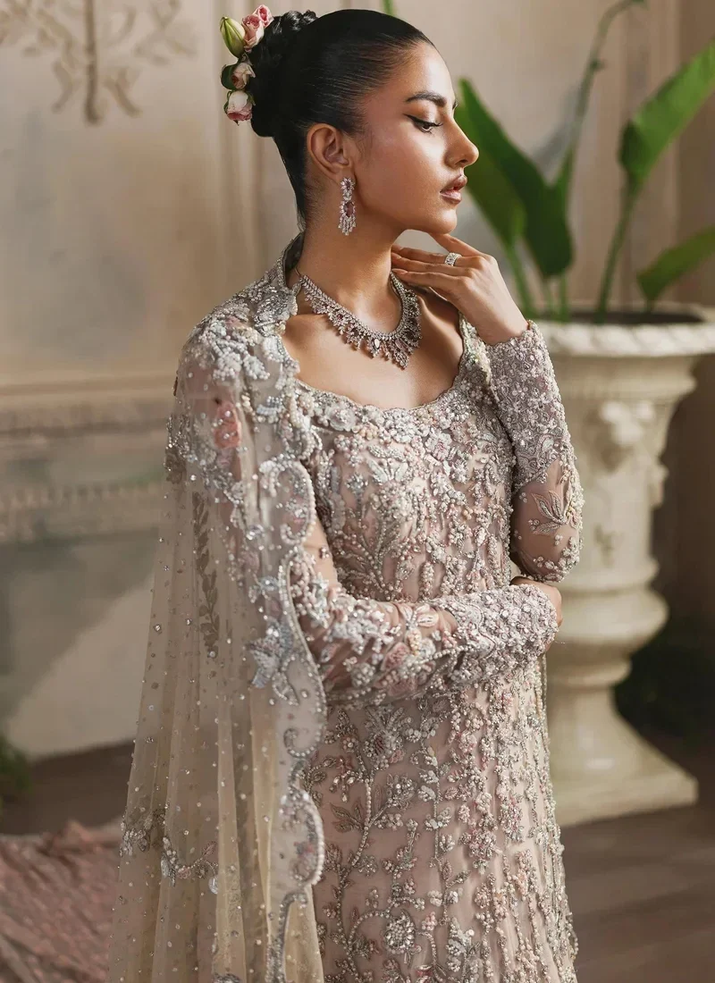 Peach bridal gown front full-length view with silver floral embroidery and a scalloped net veil