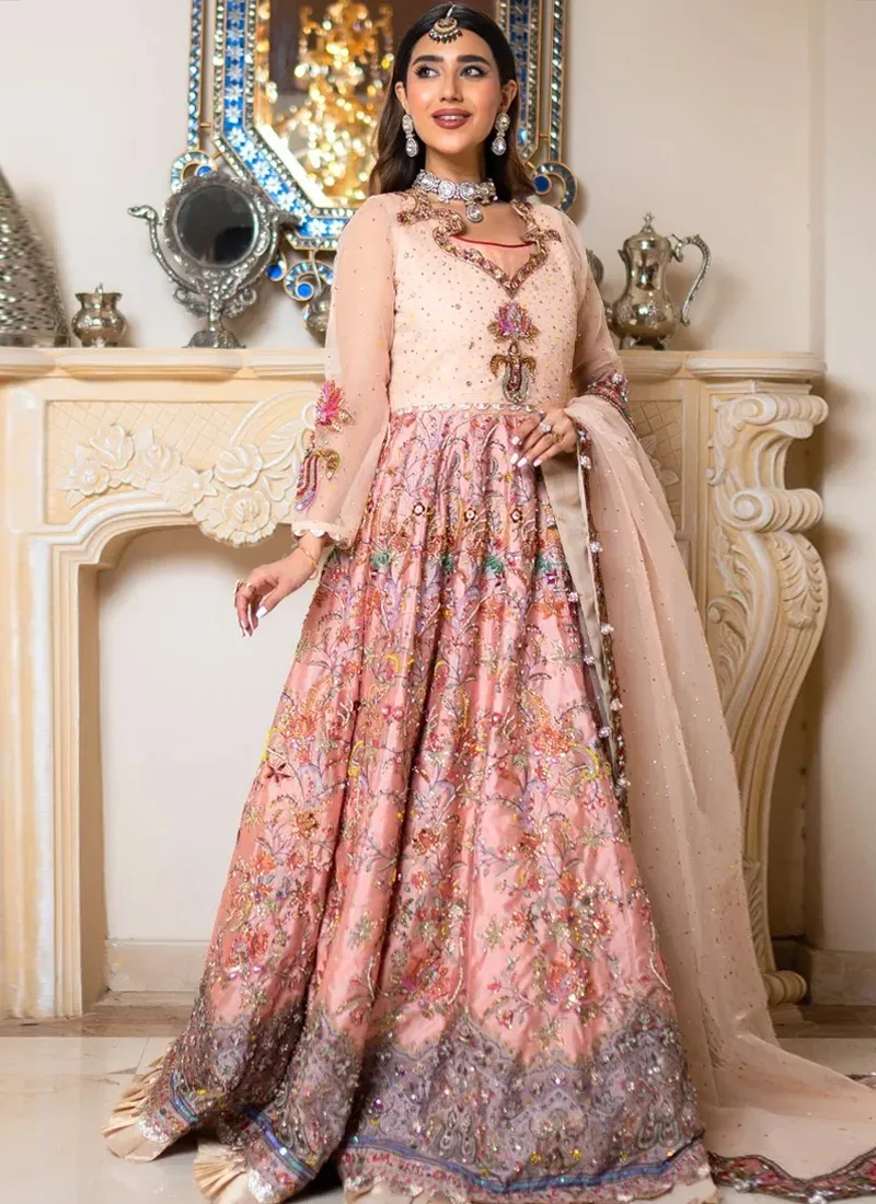 Tea Pink Nikkah Maxi with Ivory Pleated Hem Frill Salmon pink bridal maxi beneath a sheer dotted dupatta with a multicolour floral embroidered border