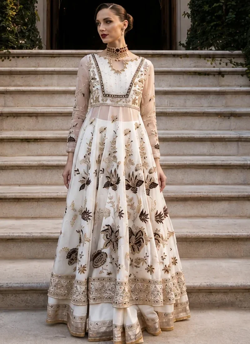 White Walima Long Peshwas with Lehenga with Black Velvet Florals White bridal pishwas rear close-up with ornate multi-cut-out back and a gold-edged sheer dupatta